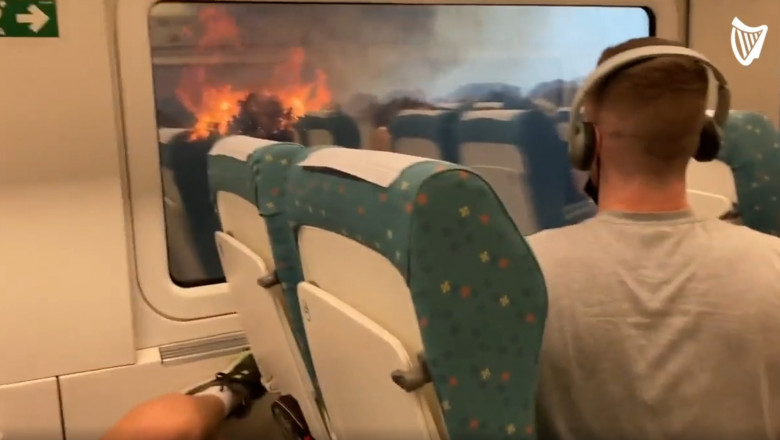 (video) Momentul în care pasagerii unui tren oprit brusc în Spania văd că sunt înconjurați de flăcări